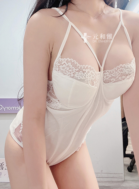 The queen's breast augmentation surgery has successfully transformed her flat E-cup into a more voluptuous figure, leaving her with a captivating silhouette.
